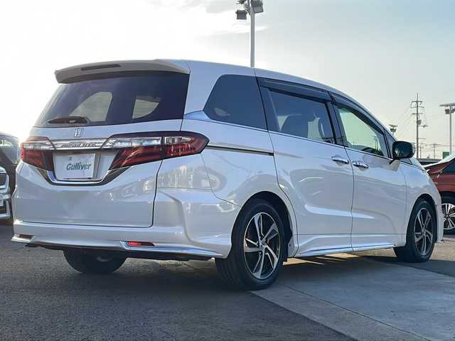 ホンダ オデッセイ アブソルート・Xホンダセンジング 徳島県 2017(平29)年 4.4万km ホワイトオーキッドパール 純正8型SDナビ　VXM-185VFEi/（ラジオ/フルセグ/DISC/SD/BT/USB）/バックカメラ/純正9型フリップダウンモニター/ホンダセンシング/追従式クルーズコントロール/ビルトインETC/ハーフレザーシート/両側電動スライドドア/パドルシフト/純正17AW/プッシュスタート/スマートキー/ドアバイザー/フォグライト/オートライト/純正フロアマット