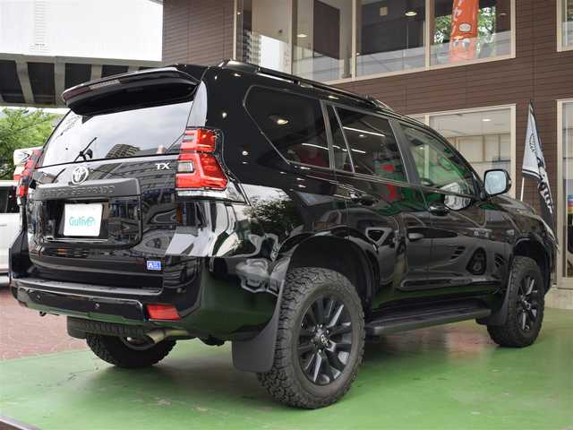 トヨタ ランドクルーザー プラド TX Lパッケージ マットブラED 神奈川県 2022(令4)年 1.1万km ブラック ワンオーナー/新車保証書/取扱説明書/サンルーフ/ルーフレール/レザーシート/・前席快適温熱シート/パワーシート/7人乗り（3列目電動格納シート）/メーカオプションTコネクトナビ/・9インチワイドタッチ式ディスプレイ/・USB入力端子/・AppleCarPlay/AndroidAuto/・Tコネクトヘルプネット/マイカーサーチ/・14スピーカー/・ETC2.0/・シャークフィンアンテナ/・マルチレインモニター（補助確認ミラー無）/・全方位カメラ/・ドアミラー足元照明/ブラインドスポットモニター/リアクロストラフィックアラート付き/セーフティセンス（衝突回避支援パッケージ）/・プリクラッシュセーフティ/　（昼夜歩行者/昼間自転車検知機能付き）/・レーンディパーチャーアラート/・オートマチックハイビーム/・レーダークルーズコントロール/・ロードサインアシスト/パーキングサポートブレーキ/LEDヘッドランプ/ヘッドランプクリーナー/LEDヘッドライト/18インチマッドブラックホイール