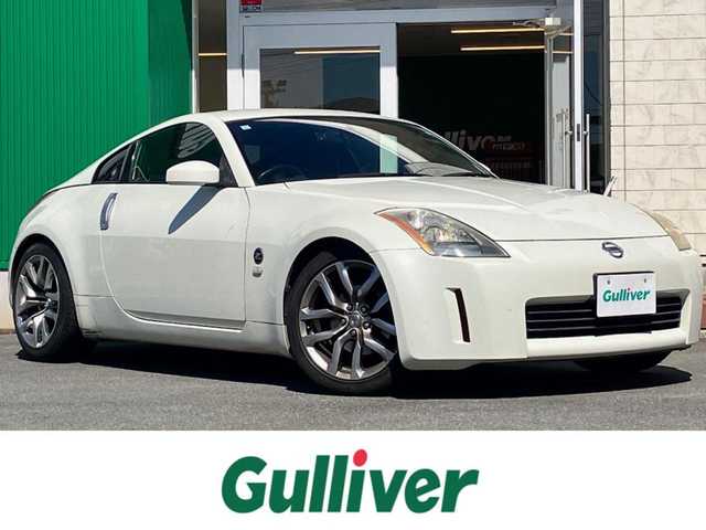 日産 フェアレディ Ｚ バージョンT 静岡県 2003(平15)年 10.7万km 白 パワーステアリング/パワーウィンドウ/オートエアコン/純正ナビ（CD/DVD）/バックカメラ/ETC/純正フロアマット/純正アルミホイール/D席N席パワーシート/D席N席シートヒーター/ABS/盗難防止装置/Wエアバック/衝突軽減システム/BOSE