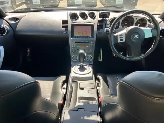 日産 フェアレディ Ｚ バージョンT 静岡県 2003(平15)年 10.7万km 白 パワーステアリング/パワーウィンドウ/オートエアコン/純正ナビ（CD/DVD）/バックカメラ/ETC/純正フロアマット/純正アルミホイール/D席N席パワーシート/D席N席シートヒーター/ABS/盗難防止装置/Wエアバック/衝突軽減システム/BOSE