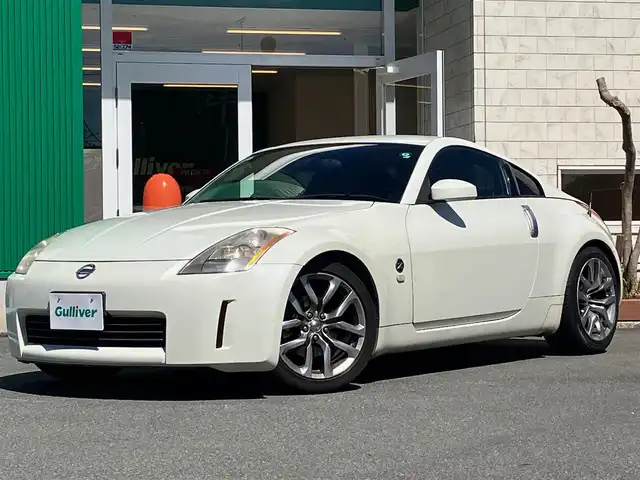 日産 フェアレディ Ｚ バージョンT 静岡県 2003(平15)年 10.7万km 白 パワーステアリング/パワーウィンドウ/オートエアコン/純正ナビ（CD/DVD）/バックカメラ/ETC/純正フロアマット/純正アルミホイール/D席N席パワーシート/D席N席シートヒーター/ABS/盗難防止装置/Wエアバック/衝突軽減システム/BOSE