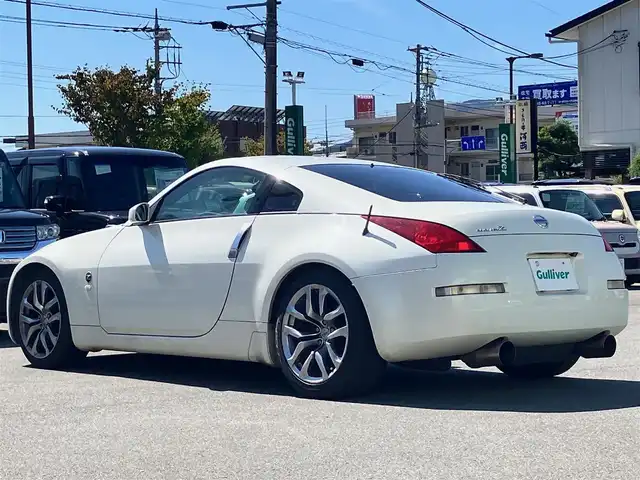 日産 フェアレディ Ｚ バージョンT 静岡県 2003(平15)年 10.7万km 白 パワーステアリング/パワーウィンドウ/オートエアコン/純正ナビ（CD/DVD）/バックカメラ/ETC/純正フロアマット/純正アルミホイール/D席N席パワーシート/D席N席シートヒーター/ABS/盗難防止装置/Wエアバック/衝突軽減システム/BOSE