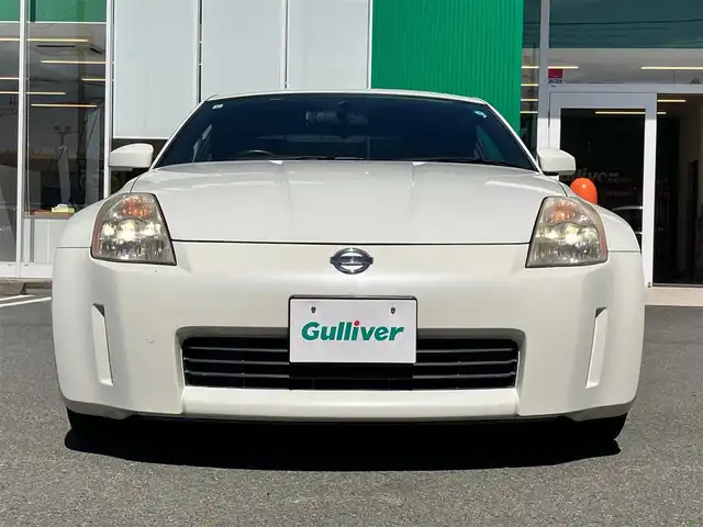 日産 フェアレディ Ｚ バージョンT 静岡県 2003(平15)年 10.7万km 白 パワーステアリング/パワーウィンドウ/オートエアコン/純正ナビ（CD/DVD）/バックカメラ/ETC/純正フロアマット/純正アルミホイール/D席N席パワーシート/D席N席シートヒーター/ABS/盗難防止装置/Wエアバック/衝突軽減システム/BOSE