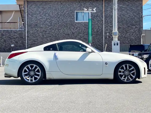 日産 フェアレディ Ｚ バージョンT 静岡県 2003(平15)年 10.7万km 白 パワーステアリング/パワーウィンドウ/オートエアコン/純正ナビ（CD/DVD）/バックカメラ/ETC/純正フロアマット/純正アルミホイール/D席N席パワーシート/D席N席シートヒーター/ABS/盗難防止装置/Wエアバック/衝突軽減システム/BOSE