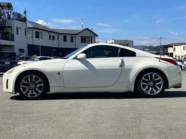日産 フェアレディ Ｚ バージョンT 静岡県 2003(平15)年 10.7万km 白 パワーステアリング/パワーウィンドウ/オートエアコン/純正ナビ（CD/DVD）/バックカメラ/ETC/純正フロアマット/純正アルミホイール/D席N席パワーシート/D席N席シートヒーター/ABS/盗難防止装置/Wエアバック/衝突軽減システム/BOSE
