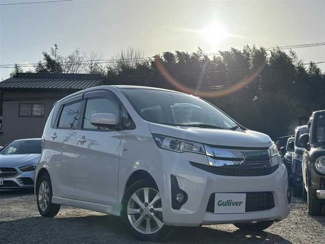 三菱 ｅＫカスタム M 熊本県 2014(平26)年 4.5万km シルキーホワイト 社外SDナビ/【フルセグTV/FM/AM/CD/DVD/USB】/アイドリングストップ/純正14インチアルミホイール/ベンチシート/リモコンキー/AAC/ABS/パワーステアリング/パワーウインドウ/取扱説明書/保証書