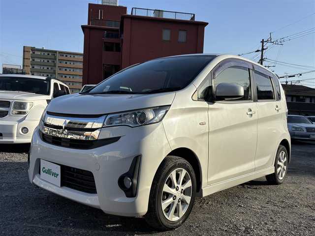 三菱 ｅＫカスタム M 熊本県 2014(平26)年 4.5万km シルキーホワイト 社外SDナビ/【フルセグTV/FM/AM/CD/DVD/USB】/アイドリングストップ/純正14インチアルミホイール/ベンチシート/リモコンキー/AAC/ABS/パワーステアリング/パワーウインドウ/取扱説明書/保証書