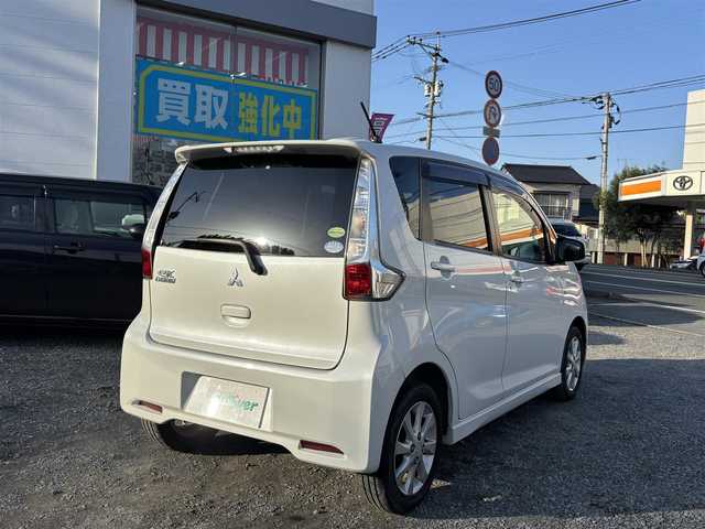 三菱 ｅＫカスタム M 熊本県 2014(平26)年 4.5万km シルキーホワイト 社外SDナビ/【フルセグTV/FM/AM/CD/DVD/USB】/アイドリングストップ/純正14インチアルミホイール/ベンチシート/リモコンキー/AAC/ABS/パワーステアリング/パワーウインドウ/取扱説明書/保証書