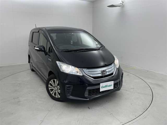 ホンダ フリード ハイブリット ジャストセレクション 茨城県 2012(平24)年 10.6万km プレミアムブラキッシュパール 社外ナビ/フルセグ視聴可能/寒冷地仕様/スペアキー/クルコン/Bluetooth/純正フロアマット/純正アルミホイール