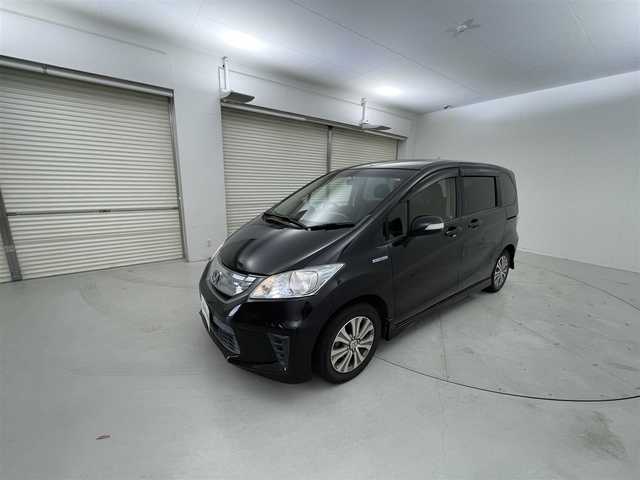 ホンダ フリード ハイブリット ジャストセレクション 茨城県 2012(平24)年 10.6万km プレミアムブラキッシュパール 社外ナビ/フルセグ視聴可能/寒冷地仕様/スペアキー/クルコン/Bluetooth/純正フロアマット/純正アルミホイール