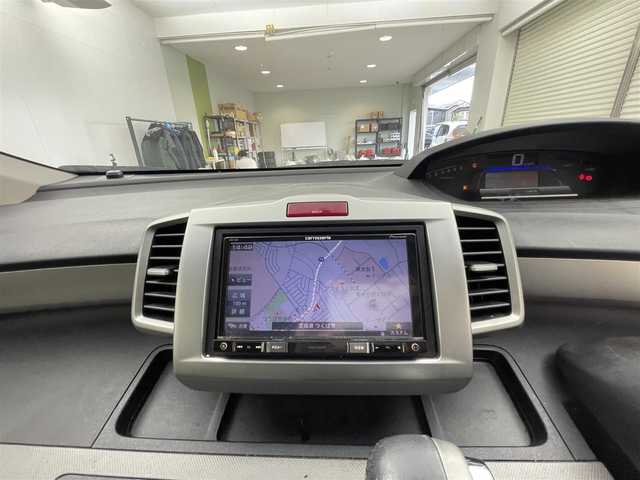 ホンダ フリード ハイブリット ジャストセレクション 茨城県 2012(平24)年 10.6万km プレミアムブラキッシュパール 社外ナビ/フルセグ視聴可能/寒冷地仕様/スペアキー/クルコン/Bluetooth/純正フロアマット/純正アルミホイール