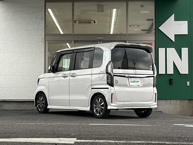 ホンダ Ｎ ＢＯＸ カスタム L 愛知県 2021(令3)年 6.8万km プラチナホワイトパール 禁煙車/片側パワースライドドア/アダプティプクルーズコントロール/レーンキープアシスト/純正ナビ（Gathers）/バックカメラ/パーキングアシスト/後方コーナーセンサー/クリアランスソナー/フルセグ/Bluetooth/ステアリングリモコン/D/N席シートヒーター/オートライト/オートハイビーム/LEDヘッドライト/フォグランプ/ドアバイザー/純正アルミ/純正フロアマット/前後ドラレコ/ETC/スペアキー/取説/保証書