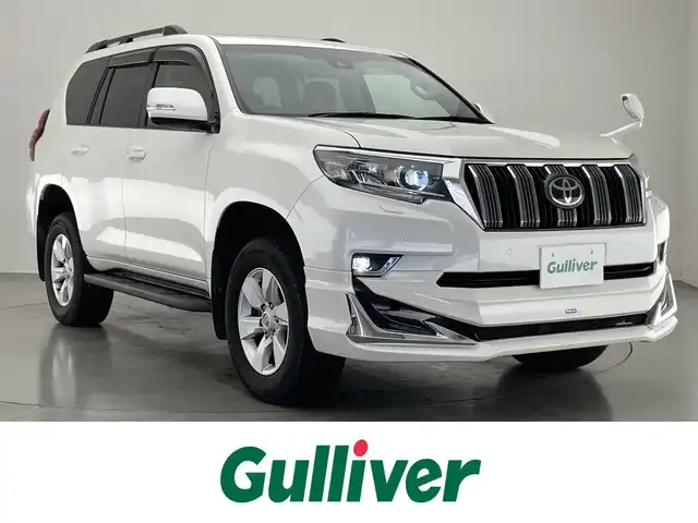 トヨタ ランドクルーザー プラド TX Lパッケージ 愛知県 2021(令3)年 4.7万km ホワイトパールクリスタルシャイン 社外９型ナビ　ムーンルーフ　モデリスタエアロ　禁煙　黒革　バックカメラ　シートヒーター　シートベンチレーション　ＥＴＣ　パワーシート　ＨＤＭＩ　ルーフレール　衝突軽減　追従クルコン　ＬＥＤオートライト　社外ツーイーター　オートハイビーム　ヘッドライトウォッシャー　純正アルミホイール　ルーフレール　