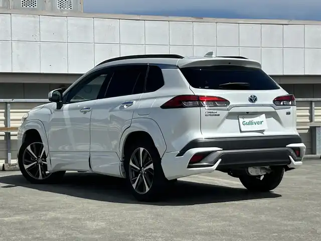 トヨタ カローラ クロス ハイブリッド Z 静岡県 2022(令4)年 2.5万km プラチナホワイトパールマイカ トヨタセーフティセンス/純正9型ディスプレイオーディオ/フルセグTV/パノラマビューモニター/パノラマルーフ/モデリスタエアロFSR/モデリスタカラードフェンダー/モデリスタバックドアガーニッシュ/モデリスタフロントグリルガーニッシュ/モデリスタミラーガーニッシュ/モデリスタドアバンドルガーニッシュ/1500W電/前席シートヒーター/ハンドルヒーター/PKSB/BSM/電動リアゲート/ドラレコ/ハーフレザーシート/純正フロアマット/ルーフレール/レーダークルーズ