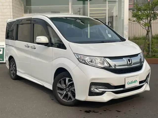 ホンダ ステップワゴン スパーダ アドバンスパッケージ β 道央・札幌 2016(平28)年 2.2万km ホワイトオーキッドパール ワンオーナー/ホンダセンシング/・衝突軽減ブレーキ〈CMBS〉/・アダプティブクルーズコントロール〈ACC〉/・車線維持支援システム〈LKAS〉/・路外逸脱抑制機能/・誤発進抑制機能/・先行車発進お知らせ機能/・標識認識機能/純正ナビ【VXM-165VFNi】/フルセグTV/CD/DVD/Bluetooth/SD/USB/バックカメラ/クルーズコントロール/わくわくゲート/両側パワースライドドア /純正16インチアルミホイール/社外16インチアルミホイールスタッドレス積み込み/LEDヘッドライト/フォグランプ/ビルトインETC/スマートキー2本/純正エンジンスターター/ステアリングリモコン