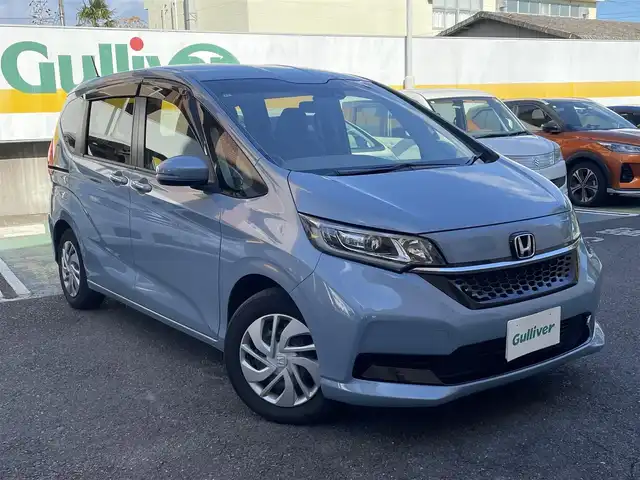 ホンダ フリード G ホンダセンシング 静岡県 2021(令3)年 3.5万km シーグラスブルーパール ワンオーナー/社外ナビ/フルセグTV/DVD/CD/SD/MSV/BT/バックカメラ/両側パワースライドドア/前後ドライブレコーダー/衝突軽減ブレーキ/レーンキープアシスト/レーダークルーズコントロール/前席シートヒーター/ステアリングスイッチ/LEDヘッドライト/ビルトインETC/スマートキー×2/保証書/取扱説明書/ナビ取扱説明書/R6点検記録簿有