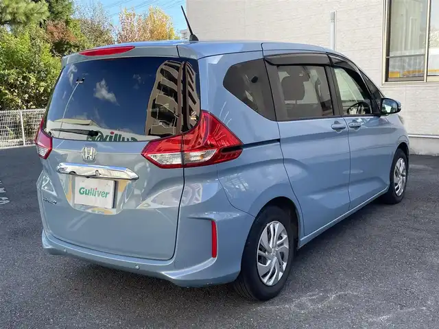 ホンダ フリード G ホンダセンシング 静岡県 2021(令3)年 3.5万km シーグラスブルーパール ワンオーナー/社外ナビ/フルセグTV/DVD/CD/SD/MSV/BT/バックカメラ/両側パワースライドドア/前後ドライブレコーダー/衝突軽減ブレーキ/レーンキープアシスト/レーダークルーズコントロール/前席シートヒーター/ステアリングスイッチ/LEDヘッドライト/ビルトインETC/スマートキー×2/保証書/取扱説明書/ナビ取扱説明書/R6点検記録簿有