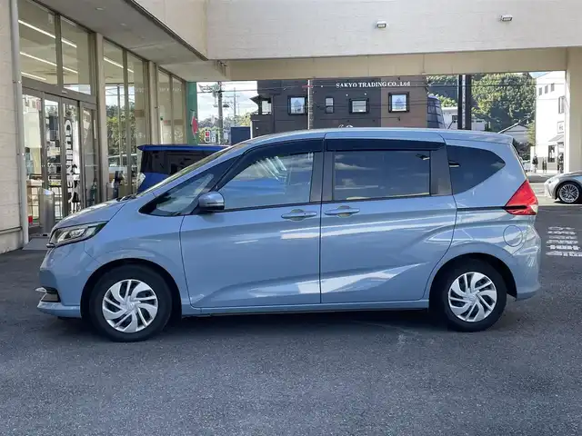 ホンダ フリード G ホンダセンシング 静岡県 2021(令3)年 3.5万km シーグラスブルーパール ワンオーナー/社外ナビ/フルセグTV/DVD/CD/SD/MSV/BT/バックカメラ/両側パワースライドドア/前後ドライブレコーダー/衝突軽減ブレーキ/レーンキープアシスト/レーダークルーズコントロール/前席シートヒーター/ステアリングスイッチ/LEDヘッドライト/ビルトインETC/スマートキー×2/保証書/取扱説明書/ナビ取扱説明書/R6点検記録簿有
