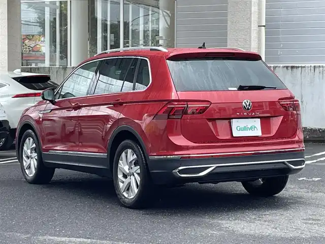 フォルクスワーゲン ＶＷ ティグアン TSI エレガンス 宮城県 2021(令3)年 3.1万km 赤 純正ナビ(AM/FM/BT)/バック・全方位カメラ/レーダークルーズコントロール/レーンキープアシスト/レーンチェンジアシスト/パーキングアシスト/電動パーキングブレーキ/ステアリングヒーター/シートヒーター（全席）/電動リアゲート/オートライト/LEDライト/ドライブレコーダー（前後）/ETC/サマータイヤ純正AW（235/55R18）
