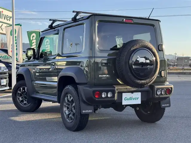 スズキ ジムニー シエラ JC 奈良県 2023(令5)年 1.8万km ジャングルグリーン carrozzeriaディスプレイオーディオ/（BT/AppleCarPlay/AndroidAut）/レーダークルズコントロール/バックカメラ/衝突軽減システム/レーンキープアシスト/前席シートヒーター/ルーフキャリア/デジタルインナーミラー/ステアリングスイッチ/LEDヘッドライト/オートライト/ヘッドライトウォッシャー/ETC/前後ドライブレコーダー/純正15インチAW/保証書/取り扱い説明書/スペアキーX1