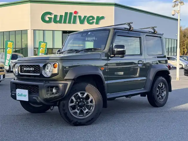 スズキ ジムニー シエラ JC 奈良県 2023(令5)年 1.8万km ジャングルグリーン carrozzeriaディスプレイオーディオ/（BT/AppleCarPlay/AndroidAut）/レーダークルズコントロール/バックカメラ/衝突軽減システム/レーンキープアシスト/前席シートヒーター/ルーフキャリア/デジタルインナーミラー/ステアリングスイッチ/LEDヘッドライト/オートライト/ヘッドライトウォッシャー/ETC/前後ドライブレコーダー/純正15インチAW/保証書/取り扱い説明書/スペアキーX1