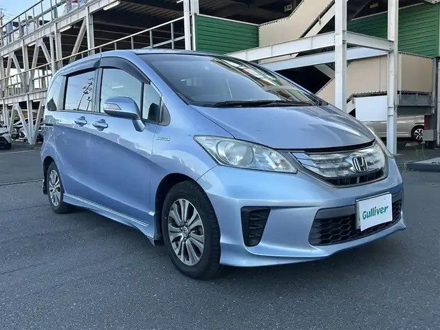 ホンダ フリード ハイブリット ジャストセレクション 静岡県 2013(平25)年 12万km プレミアムブルーオパールメタリック ストラーダナビ/CD/DVD/Bluetooth/クルーズコントロール/両側パワースライドドア/フルセグ/ドライブレコーダー/純正フロアマット/純正アルミホイール/ハーフレザーシート/ETC