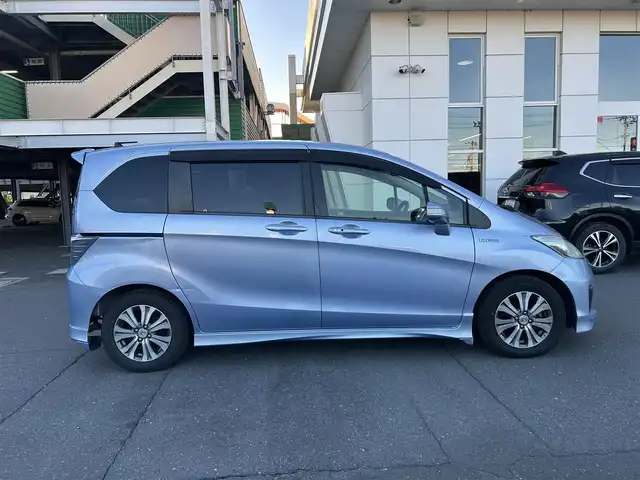 ホンダ フリード ハイブリット ジャストセレクション 静岡県 2013(平25)年 12万km プレミアムブルーオパールメタリック ストラーダナビ/CD/DVD/Bluetooth/クルーズコントロール/両側パワースライドドア/フルセグ/ドライブレコーダー/純正フロアマット/純正アルミホイール/ハーフレザーシート/ETC