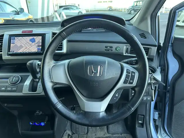 ホンダ フリード ハイブリット ジャストセレクション 静岡県 2013(平25)年 12万km プレミアムブルーオパールメタリック ストラーダナビ/CD/DVD/Bluetooth/クルーズコントロール/両側パワースライドドア/フルセグ/ドライブレコーダー/純正フロアマット/純正アルミホイール/ハーフレザーシート/ETC