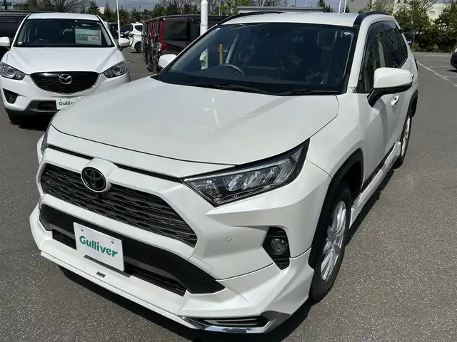 トヨタ ＲＡＶ４ G Zパッケージ 青森県 2021(令3)年 3.1万km ホワイトパールクリスタルシャイン ・4WD/・純正ディスプレイナビ/・フルセグTV/・USB/Bluetooth/・全方位カメラ/・デジタルインナーミラー/・パワーバックドア/・プッシュスタート/・スマートキー/・横滑り防止/・レーンキープアシスト/・パワーシート（D）/・ハンドルヒーター/・シートヒーター/・ドライブレコーダー（前後）/・レーダークルーズコントロール/・オートライト/・オートマチックハイビーム/・ダウンヒルコントロール/・純正フロアマット/・夏タイヤ車載（純正AW付）
