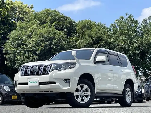 トヨタ ランドクルーザー プラド TX 東京都 2018(平30)年 8.8万km ホワイトパールクリスタルシャイン ワンオーナー/サンルーフ/クリアランスソナー前後/純正メモリナビ（NSZT-W66T）/・フルセグTV/Bluetoothオーディオ/DVD/バックカメラ/ドライブレコーダー前後（DRV-MR740）/Toyota Safety Sense/・プリクラッシュセーフティ/・レーンディパーチャーアラート/・オートマチックハイビーム/・レーダークルーズコントロール/純正アルミホイール17インチ/純正フロアマット/保証書/取扱説明書/スペアキー