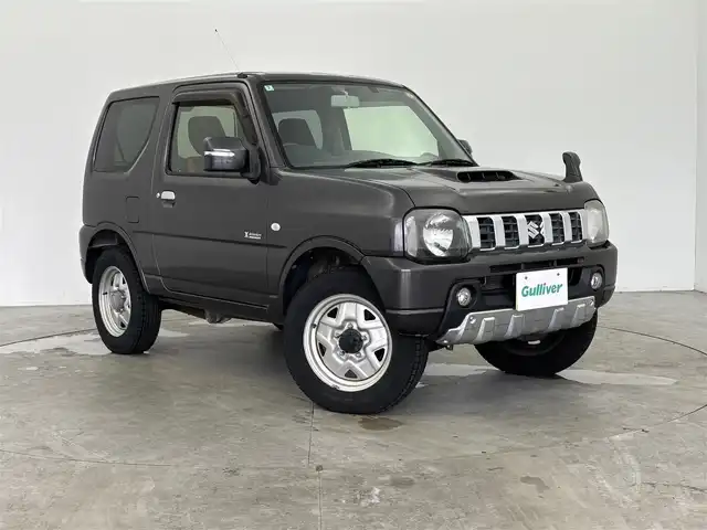 スズキ ジムニー クロスアドベンチャー 富山県 2014(平26)年 4.3万km クエーサーグレーメタリック 4WD/黒革シート/運転席シートヒーター /社外オーディオ（FH-580）（CD）/キーレス /フォグ/純正マット/電格ミラー/保証書、取説/スペアキー（板キー）