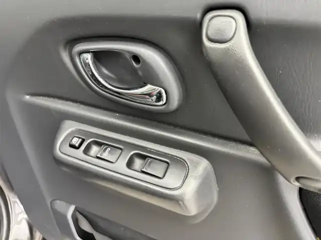 スズキ ジムニー クロスアドベンチャー 富山県 2014(平26)年 4.3万km クエーサーグレーメタリック 4WD/黒革シート/運転席シートヒーター /社外オーディオ（FH-580）（CD）/キーレス /フォグ/純正マット/電格ミラー/保証書、取説/スペアキー（板キー）
