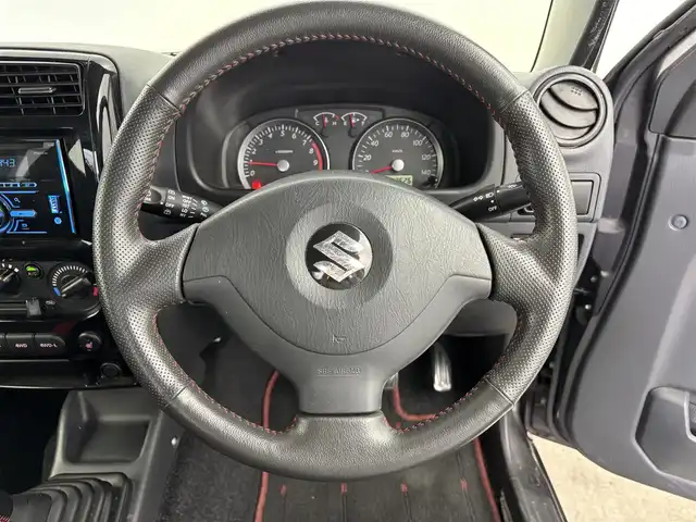 スズキ ジムニー クロスアドベンチャー 富山県 2014(平26)年 4.3万km クエーサーグレーメタリック 4WD/黒革シート/運転席シートヒーター /社外オーディオ（FH-580）（CD）/キーレス /フォグ/純正マット/電格ミラー/保証書、取説/スペアキー（板キー）