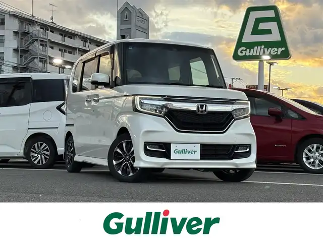 ホンダ Ｎ ＢＯＸ カスタム G EX ホンダセンシング 大分県 2018(平30)年 7.1万km パール ・純正ナビ(CD/DVD/BT/SD)/・フルセグテレビ/・バックカメラ/・衝突軽減/・コーナーセンサー/・片側パワースライド/・オートハイビーム/・ETC/・スマートキー/・プッシュスタート