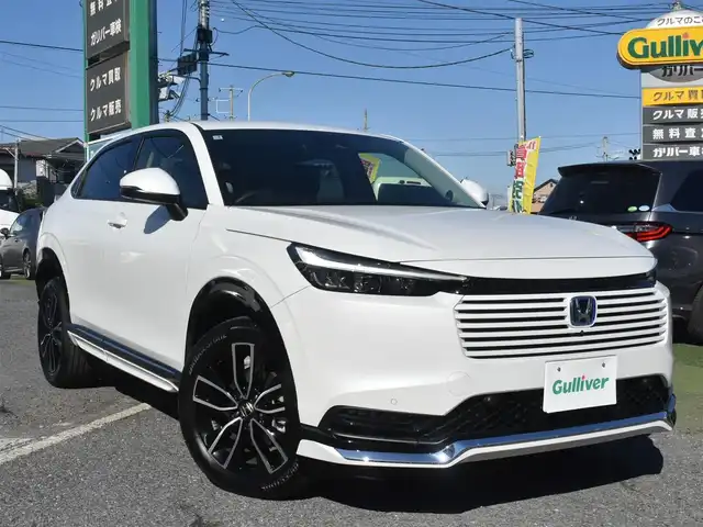 ホンダ ヴェゼル ハイブリッド e:HEV Z 神奈川県 2025(令7)年 0.3万km プラチナホワイトパール ワンオーナー/HONDAコネクトディスプレイ/：9インチワイドディスプレイ/：ビルトインETC2.0/：ワイヤレス充電器/：全方位モニター/：フルセグTV/：Bluetoothオーディオ/：TVキャンセラー/：ナビキャンセラー/HONDAセンシング/：安全運転支援パッケージ/フルLEDヘッドランプ/：オートレベリング機構/：LEDアクティブコーナリングライト/：シーケンシャルターンランプ/純正18インチアルミホイール/左右独立温度調整オートエアコン/ハンズフリーパワーバックドア/トノカバー/純正フロアマット/：ドアバイザー/シートヒーター（前席）/ーーーーーーーーーーーーーーーーーーーーーーーー/保証書/取扱説明書/スペアスマートキー×1本