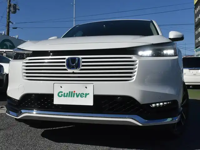 ホンダ ヴェゼル ハイブリッド e:HEV Z 神奈川県 2025(令7)年 0.3万km プラチナホワイトパール ワンオーナー/HONDAコネクトディスプレイ/：9インチワイドディスプレイ/：ビルトインETC2.0/：ワイヤレス充電器/：全方位モニター/：フルセグTV/：Bluetoothオーディオ/：TVキャンセラー/：ナビキャンセラー/HONDAセンシング/：安全運転支援パッケージ/フルLEDヘッドランプ/：オートレベリング機構/：LEDアクティブコーナリングライト/：シーケンシャルターンランプ/純正18インチアルミホイール/左右独立温度調整オートエアコン/ハンズフリーパワーバックドア/トノカバー/純正フロアマット/：ドアバイザー/シートヒーター（前席）/ーーーーーーーーーーーーーーーーーーーーーーーー/保証書/取扱説明書/スペアスマートキー×1本