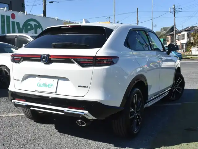 ホンダ ヴェゼル ハイブリッド e:HEV Z 神奈川県 2025(令7)年 0.3万km プラチナホワイトパール ワンオーナー/HONDAコネクトディスプレイ/：9インチワイドディスプレイ/：ビルトインETC2.0/：ワイヤレス充電器/：全方位モニター/：フルセグTV/：Bluetoothオーディオ/：TVキャンセラー/：ナビキャンセラー/HONDAセンシング/：安全運転支援パッケージ/フルLEDヘッドランプ/：オートレベリング機構/：LEDアクティブコーナリングライト/：シーケンシャルターンランプ/純正18インチアルミホイール/左右独立温度調整オートエアコン/ハンズフリーパワーバックドア/トノカバー/純正フロアマット/：ドアバイザー/シートヒーター（前席）/ーーーーーーーーーーーーーーーーーーーーーーーー/保証書/取扱説明書/スペアスマートキー×1本