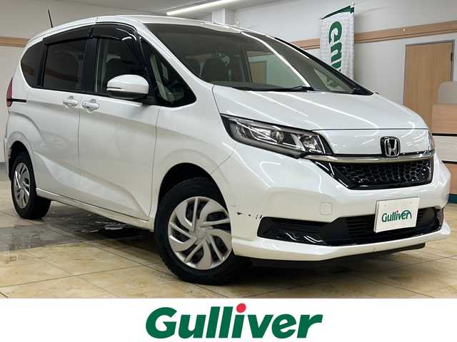 ホンダ フリード G 道央・札幌 2022(令4)年 2.5万km プラチナホワイトパール ・ワンオーナー/・4WD/・純正9インチナビ/・フルセグTV/DVD/CD/SD/BT/・バックカメラ/・純正リヤフリップダウンモニター/・ドライブレコーダー/・両側パワースライドドア/・CMBS/・アダプティブクルーズコントロール/・先行車発進お知らせ/・路外逸脱抑制システム/・レーンキープアシスト/・標識認識機能/・横滑り防止/・ワイパーデアイサー/・ETC/・LEDヘッドライト/・前席シートヒーター/・アイドリングストップ/・プッシュスタート/・スマートキー/・ドアバイザー/・電格ミラー/・ミラーヒーター