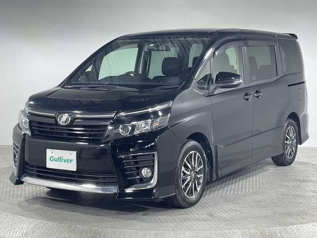 トヨタ ヴォクシー ZS 神奈川県 2014(平26)年 6.7万km ブラック 純正７型SDナビゲーション【NSZN-W64T】/純正リアエンターテーメント【後席モニター】/両側電動スライドドア【サンシェード】/フルセグ　CD DVD　AM FM Bluetooth　HDMI　SDREC　USB/アイドリングストップ/革巻きステアリング/ステアリングスイッチ【オーディオ】/社外前方ドライブレコーダー/ビルトインETC/プッシュスタート/スマートキー/LEDヘッドランプ/オートライト/フロントフォグランプ/純正16インチアルミホイール/純正サイドシル　リアスポイラー/電格ウインカーミラー