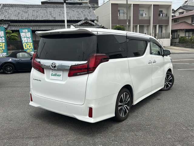トヨタ アルファード S Cパッケージ 愛知県 2021(令3)年 1.7万km ホワイトパールクリスタルシャイン /禁煙車/ワンオーナー//メーカーＯＰナビ//ＪＢＬサウンド//フルセグＴＶ//Bluetooth//CD・DVDプレーヤー//パノラミックビューモニター//ビルトインETC2.0//純正フリップダウンモニター//デジタルインナーミラー//前後ドライブレコーダー（CD-20）//インテリジェントパーキングアシスト//プリクラッシュセーフティ//レーントレーシングアシスト//クリアランスソナー//ブラインドスポットモニター//レーダークルーズコントロール//両側パワースライドドア//パワーバックドア//前席パワーシート（D席メモリ付き）//前席シートヒーター//前席シートベンチレーション//ステアリングヒーター//電動パーキング//純正１８インチアルミ//3眼LEDオートライト//オートマチックハイビーム//社外フロアマット//純正ドアバイザー//AC100V電源//新車保証書/取扱説明書//スペアキー
