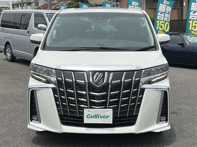 トヨタ アルファード S Cパッケージ 愛知県 2021(令3)年 1.7万km ホワイトパールクリスタルシャイン /禁煙車/ワンオーナー//メーカーＯＰナビ//ＪＢＬサウンド//フルセグＴＶ//Bluetooth//CD・DVDプレーヤー//パノラミックビューモニター//ビルトインETC2.0//純正フリップダウンモニター//デジタルインナーミラー//前後ドライブレコーダー（CD-20）//インテリジェントパーキングアシスト//プリクラッシュセーフティ//レーントレーシングアシスト//クリアランスソナー//ブラインドスポットモニター//レーダークルーズコントロール//両側パワースライドドア//パワーバックドア//前席パワーシート（D席メモリ付き）//前席シートヒーター//前席シートベンチレーション//ステアリングヒーター//電動パーキング//純正１８インチアルミ//3眼LEDオートライト//オートマチックハイビーム//社外フロアマット//純正ドアバイザー//AC100V電源//新車保証書/取扱説明書//スペアキー