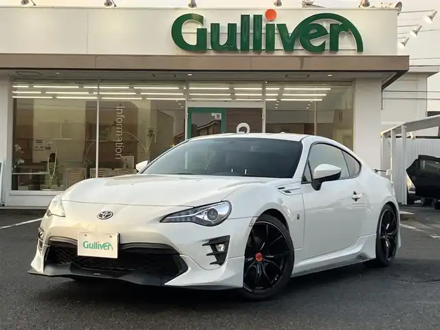 トヨタ ８６ GT リミテッド 三重県 2017(平29)年 4.9万km クリスタルホワイトパール 登録時走行距離48139km/TRDエアロF・S/TEIN車高調(ローダウン)/社外マフラー(ロッソモデロ)/社外18インチAW(レイズ)/社外テールランプ/♪純正SDナビ/ ・ワンセグ・BTオーディオ/ ・CD再生・SD/♪スマートキー/♪プッシュスタート/♪クルーズコントロール/♪ハーフレザーシート/♪前席シートヒーター /♪ドライブレコーダー/♪LEDヘッドライト/♪LEDフォグライト/♪オートライト/♪ヘッドライトレベライザー/♪革巻きステアリング/♪ステアリングスイッチ/♪フロアマット/♪スモークフィルム/♪電格ミラー/♪サイド/カーテンエアバック/純正テールランプ積み込み