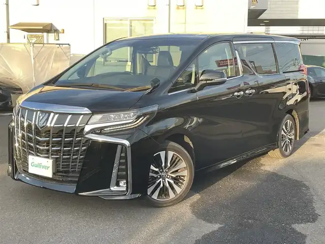 トヨタ アルファード S Cパッケージ 広島県 2021(令3)年 2.3万km ブラック 登録時走行距離/　22214km/ワンオーナー/純正メモリーナビ/　【CD/DVD/BT/USB/Miracast/フルセグTV】/純正フリップダウンモニター/バックカメラ/クルーズコントロール(追従走行有り)/衝突被害軽減ブレーキ(プリクラッシュセーフティ：PCS)/パーキングサポートブレーキ/　(後方衝突被害軽減ブレーキ：PKSB)/車線逸脱警報(レーンディバーチャーアラート：LTA)/両側パワースライドドア/パワーバックドア/ビルトインETC/前後ドライブレコーダー/１列目２列目パワーシート/シートヒーター／エアシート/オットマン/１００V電源/ステアリングヒーター/デジタルインナーミラー/オートワイパー/オートライト/純正LEDライト/フォグランプ/スマートキー/スペアキー/エンジンスタートボタン/横滑り防止装置/カーテンエアバッグ/純正フロアマット/保証書