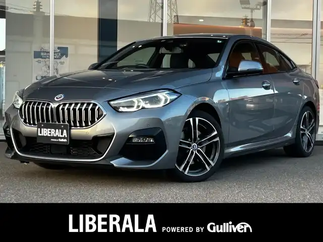 ＢＭＷ ２１８ｉ グランクーペ Mスポーツ 富山県 2022(令4)年 2.1万km グレーⅡ 純正HDDナビ/AM/FMラジオ/Bluetooth接続/AppleCarPlay/android　auto/MirrorLink/D/N席パワーシート/バックカメラ/コーナーセンサー/パーキングアシスト/衝突軽減装置/アイドリングストップ/ACC/ワイヤレス充電/ドライブレコーダー/アンビエントライト/純正18インチAW/ETC2.0/ETC