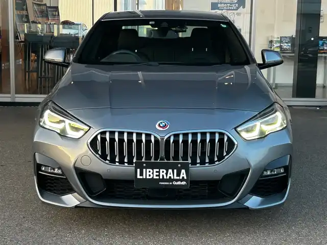ＢＭＷ ２１８ｉ グランクーペ Mスポーツ 富山県 2022(令4)年 2.1万km グレーⅡ 純正HDDナビ/AM/FMラジオ/Bluetooth接続/AppleCarPlay/android　auto/MirrorLink/D/N席パワーシート/バックカメラ/コーナーセンサー/パーキングアシスト/衝突軽減装置/アイドリングストップ/ACC/ワイヤレス充電/ドライブレコーダー/アンビエントライト/純正18インチAW/ETC2.0/ETC