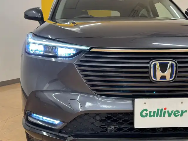 ホンダ ヴェゼル ハイブリッド e:HEV Z 群馬県 2022(令4)年 9.5万km メテオロイドグレーメタリック 安全装備/・衝突軽減ブレーキ/・踏み間違え衝突軽減システム/・ブラインドスポットモニター/・レーンキープアシスト/純正ナビ/　（AM/FM/CD/DVD/BT/USB）/フルセグTV/バックカメラ/レーダークルーズコントロール/前席シートヒーター/ステアリングヒーター/ステアリングスイッチ/ETC/ダウンヒルアシスト/電動パーキング/オートブレーキホールド/フロントデアイサ/パーキングセンサーシステム/パダルシフト/オートライト