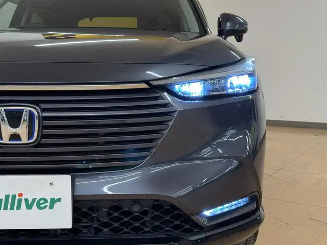 ホンダ ヴェゼル ハイブリッド e:HEV Z 群馬県 2022(令4)年 9.5万km メテオロイドグレーメタリック 安全装備/・衝突軽減ブレーキ/・踏み間違え衝突軽減システム/・ブラインドスポットモニター/・レーンキープアシスト/純正ナビ/　（AM/FM/CD/DVD/BT/USB）/フルセグTV/バックカメラ/レーダークルーズコントロール/前席シートヒーター/ステアリングヒーター/ステアリングスイッチ/ETC/ダウンヒルアシスト/電動パーキング/オートブレーキホールド/フロントデアイサ/パーキングセンサーシステム/パダルシフト/オートライト