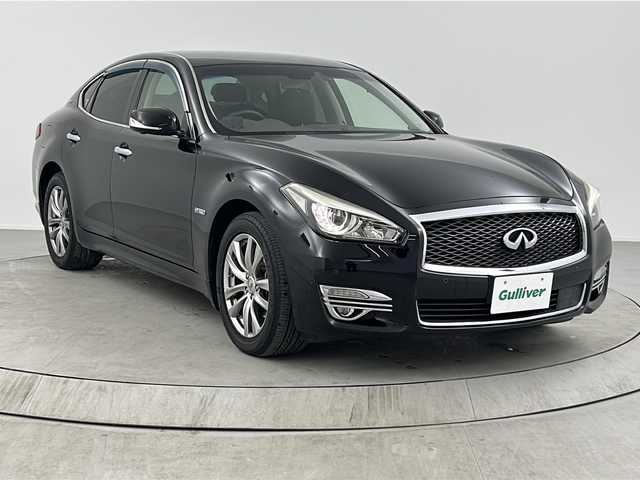 日産 フーガ ハイブリッド VIP 熊本県 2015(平27)年 8.2万km ガーネットブラック 純正HDDナビ/・フルセグTV/CD/DVD/BT/・全方位カメラ/エマージェンシーブレーキ/車線逸脱警報/アダプティブクルーズコントロール/コーナーセンサー/革シート/・D/Nパワーシート/・D/Nシートヒーター/・D/Nシートクーラー/・D席メモリシート/・後席パワーシート/・後席シートヒーター/ビルトインETC/オートライト/LEDヘッドライト/フォグランプ/スマートキー/スペアキー/プッシュスタート/純正フロアマット/ドアバイザー/取扱説明書