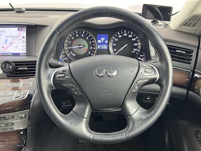 日産 フーガ ハイブリッド VIP 熊本県 2015(平27)年 8.2万km ガーネットブラック 純正HDDナビ/・フルセグTV/CD/DVD/BT/・全方位カメラ/エマージェンシーブレーキ/車線逸脱警報/アダプティブクルーズコントロール/コーナーセンサー/革シート/・D/Nパワーシート/・D/Nシートヒーター/・D/Nシートクーラー/・D席メモリシート/・後席パワーシート/・後席シートヒーター/ビルトインETC/オートライト/LEDヘッドライト/フォグランプ/スマートキー/スペアキー/プッシュスタート/純正フロアマット/ドアバイザー/取扱説明書