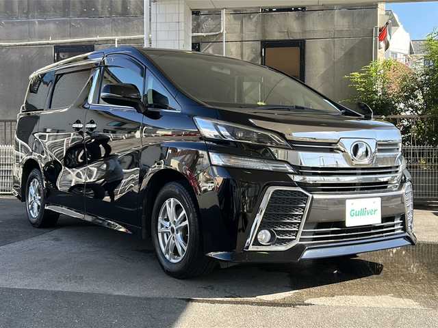 トヨタ ヴェルファイア Z 京都府 2016(平28)年 7.5万km ブラック 純正SDナビ/フルセグTV/Bluetooth Audio/CD/DVD/バックカメラ/両側パワースライドドア/レーダー探知機/AUTO SECURITY SYSTEM/2列目オットマン/ステアリングスイッチ/電動パーキングブレーキ/電格ウィンカーミラー/オートリトラクタブルミラー/プッシュスタート/オールオートパワーウィンドウ/純正フロアマット/純正/保証書/取扱説明書/ナビ取扱説明書